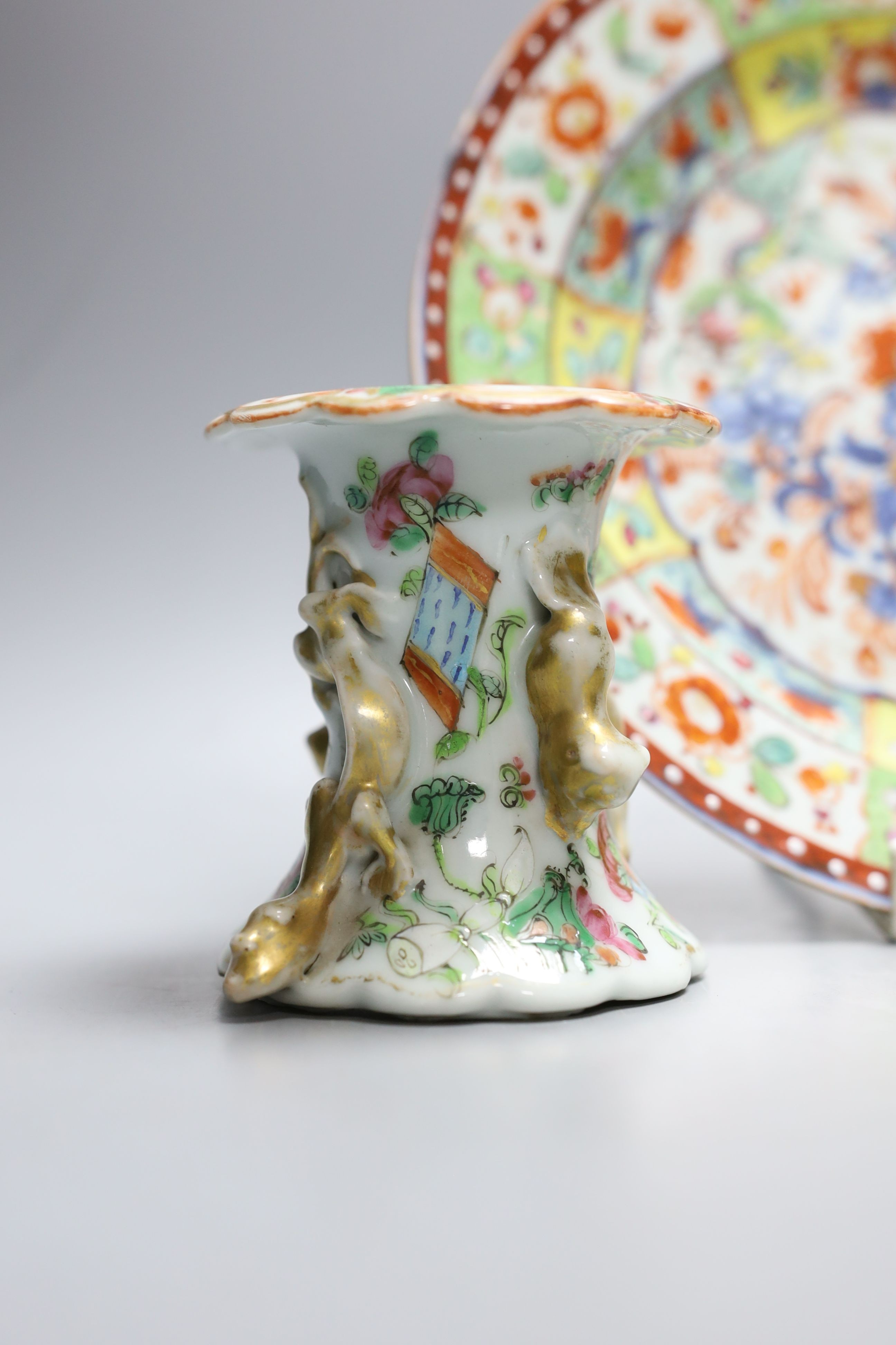 A Chinese yellow ground ‘dragon’ stem cup, a clobbered dish and two other pieces